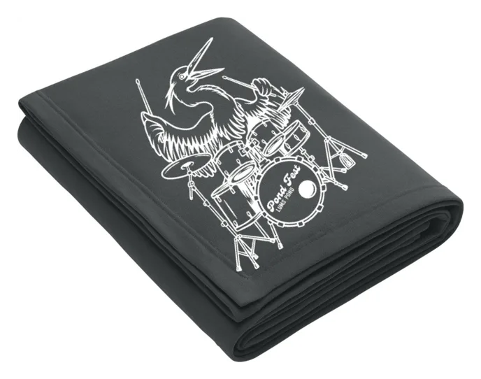 Folded dark fleece blanket with the heron drummer in white